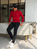 Crimson long-sleeve knit polo shirt.