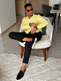 Yellow and white striped long-sleeve button-up shirt.